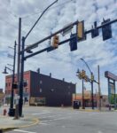 Pedestrians Will Have To Hit Walk Sign At Main Street Intersections