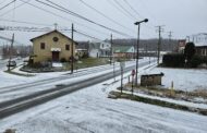 Cold Snap And Snowy Weather Greets Commuters