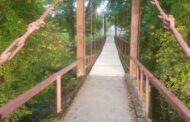 Woman Injured After Jumping Off Swinging Bridge