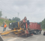 Dump Truck Hauling a Tractor Flipped Over on RT. 19, Expect Delays